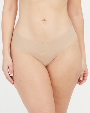 Beige Spanx Under Statements® Thong | DKAMI-8742