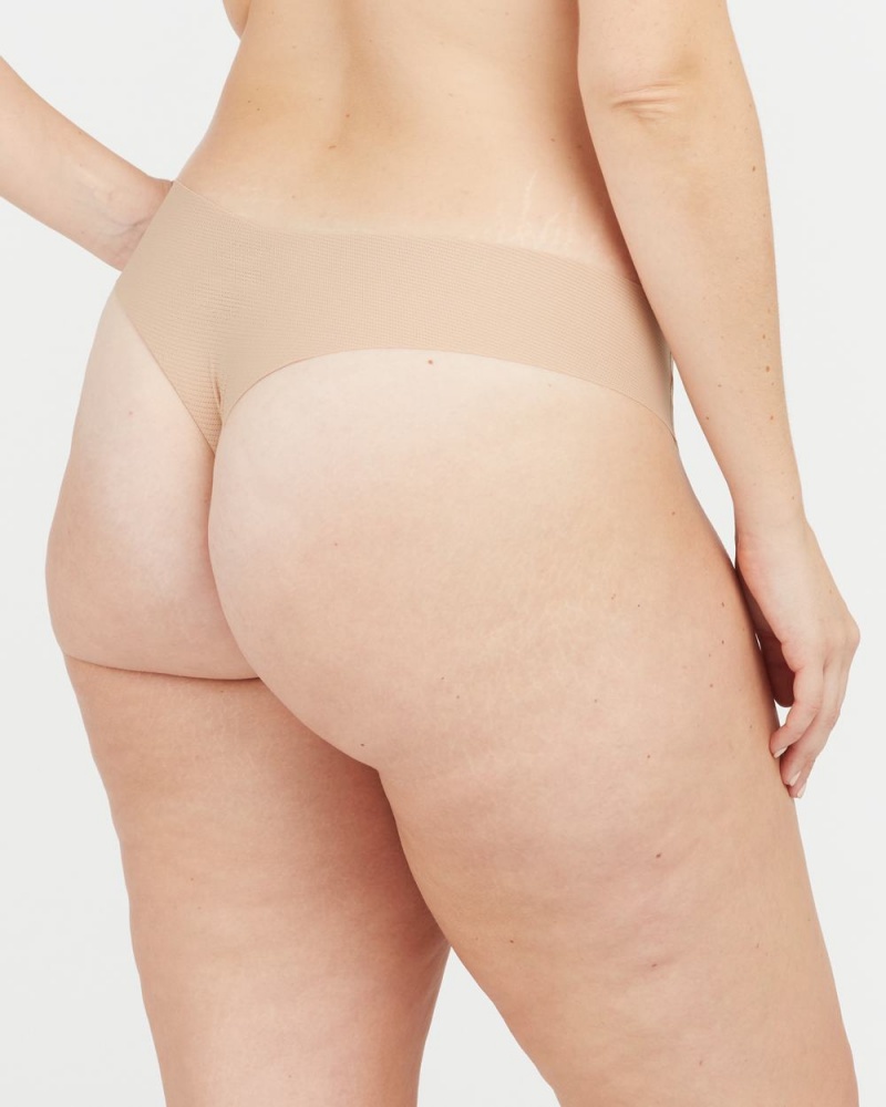 Beige Spanx Under Statements® Thong | DKAMI-8742